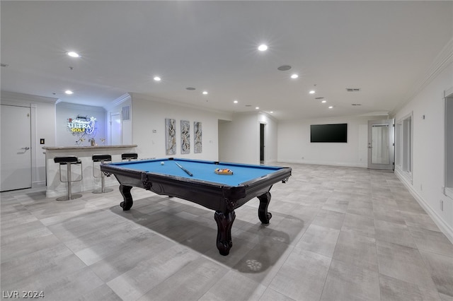 rec room with ornamental molding, bar, and pool table