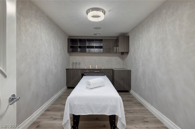 bedroom featuring light wood-type flooring