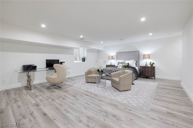 bedroom with light hardwood / wood-style floors