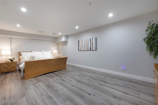 bedroom with light hardwood / wood-style flooring