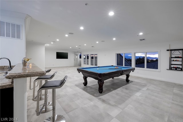 recreation room featuring ornamental molding, sink, and pool table