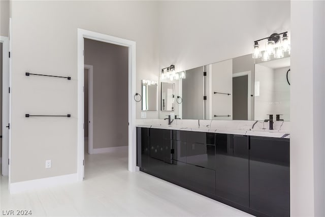 bathroom featuring tile patterned floors and vanity