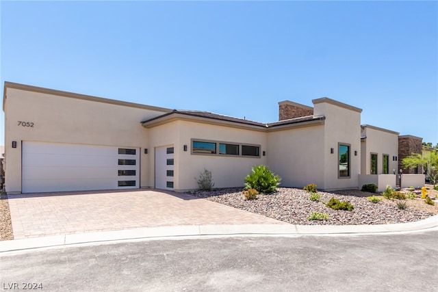 view of front of home with a garage