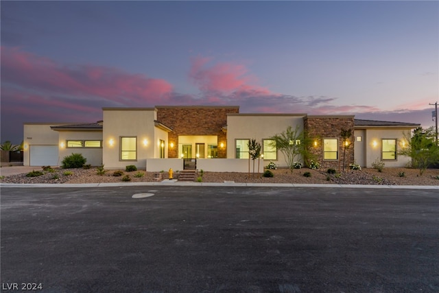 contemporary house featuring a garage