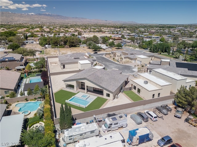 drone / aerial view featuring a mountain view