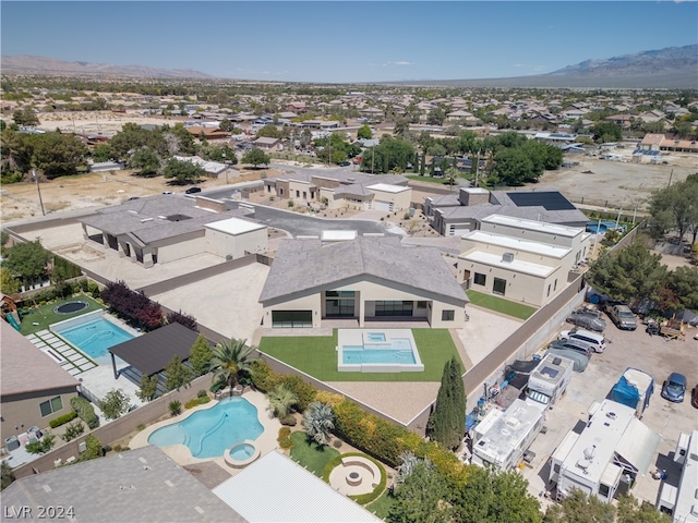 drone / aerial view featuring a mountain view