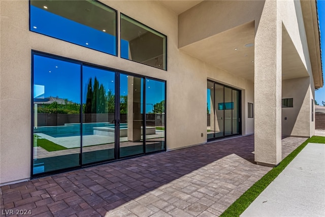 view of patio / terrace featuring a fenced in pool