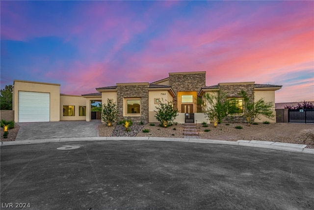 view of front of home with a garage