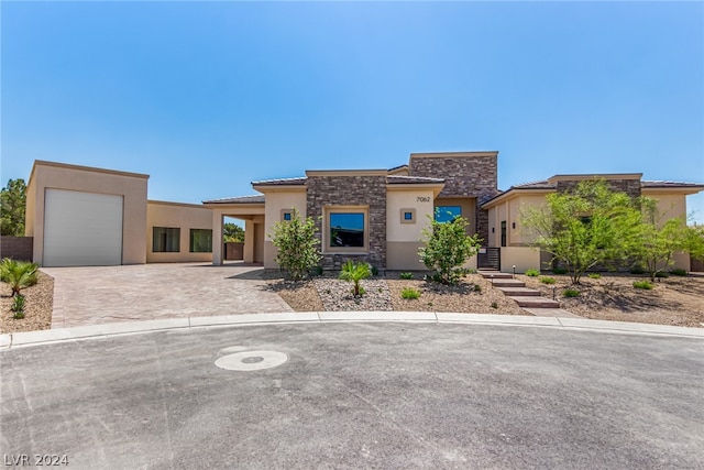 view of front of property featuring a garage