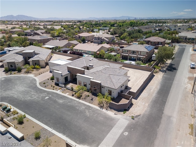 drone / aerial view featuring a mountain view