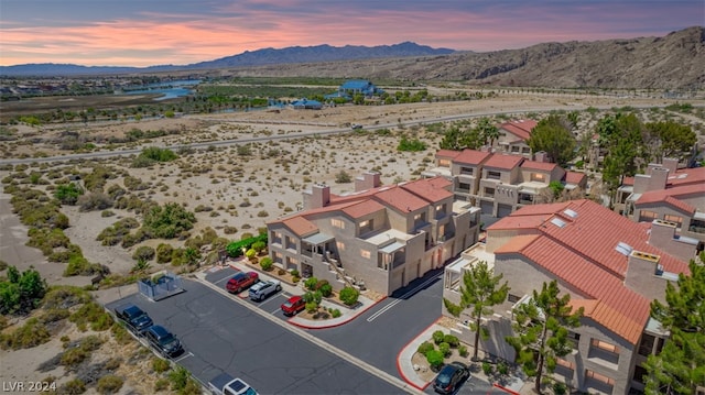 aerial view at dusk with a mountain view