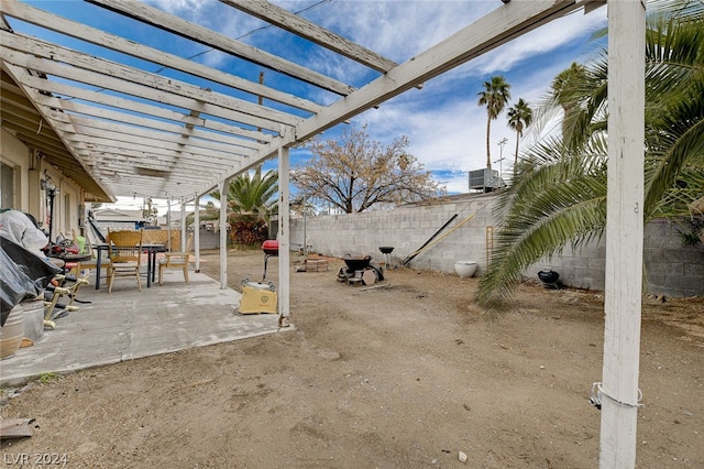 view of yard with a patio and a pergola