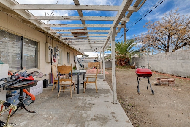 view of patio featuring a pergola