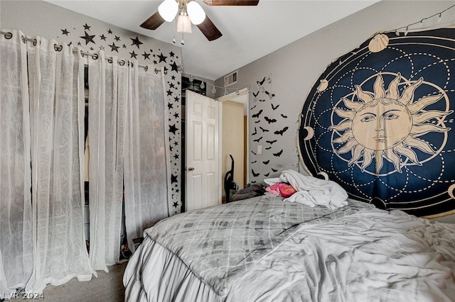 carpeted bedroom featuring ceiling fan