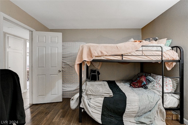 bedroom featuring dark wood-type flooring