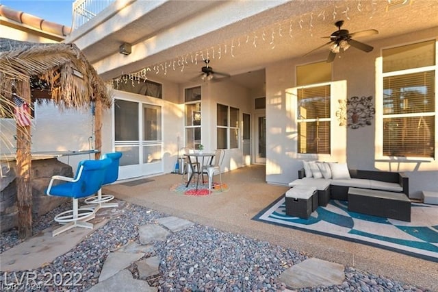 view of patio / terrace featuring ceiling fan and outdoor lounge area