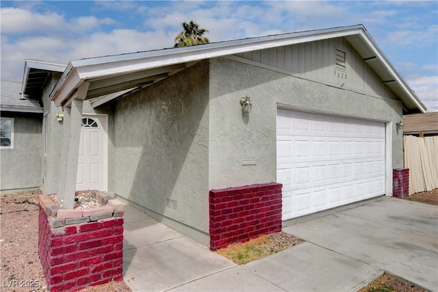 garage with driveway