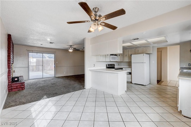 kitchen featuring light carpet, open floor plan, white appliances, a peninsula, and light countertops