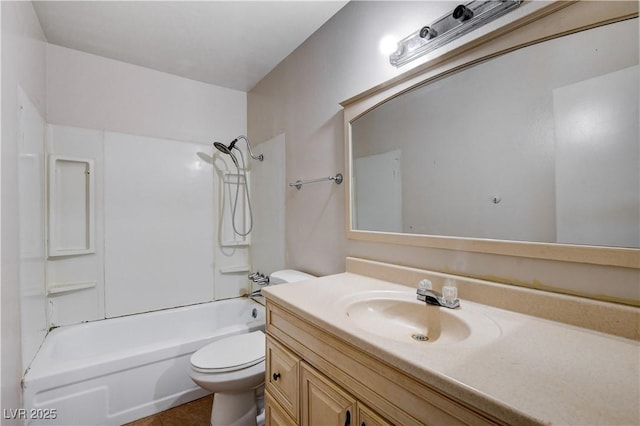 bathroom with vanity, shower / bathing tub combination, and toilet