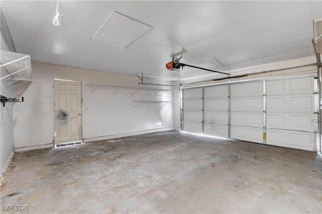 garage featuring a garage door opener