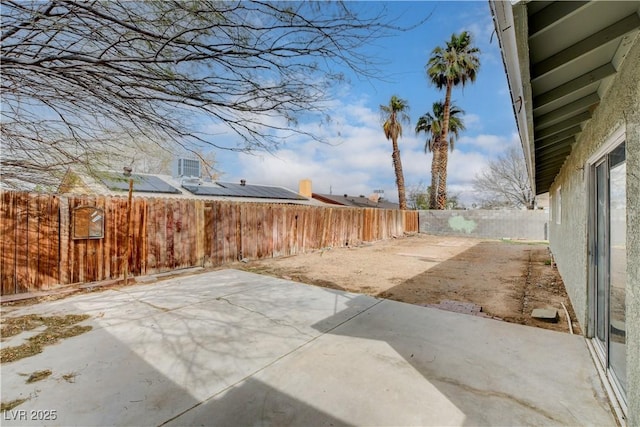 view of yard with a patio and a fenced backyard