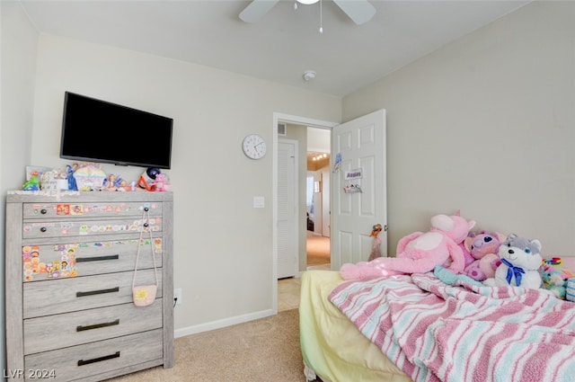 carpeted bedroom with ceiling fan