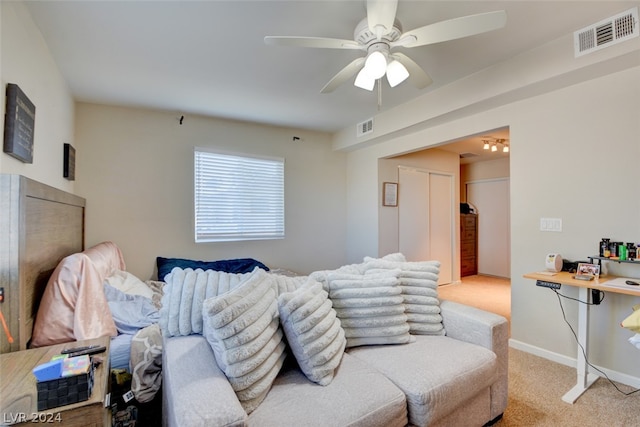 bedroom with ceiling fan and carpet floors