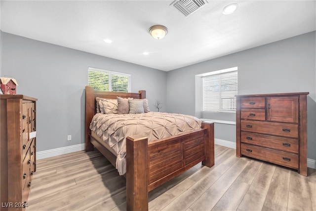 bedroom featuring light wood-type flooring