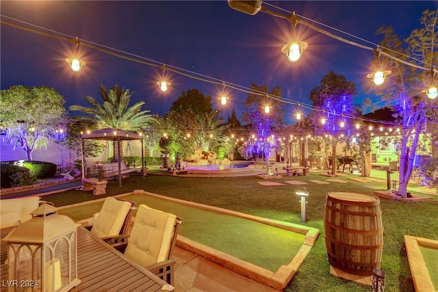 exterior space featuring a patio, a gazebo, and a yard