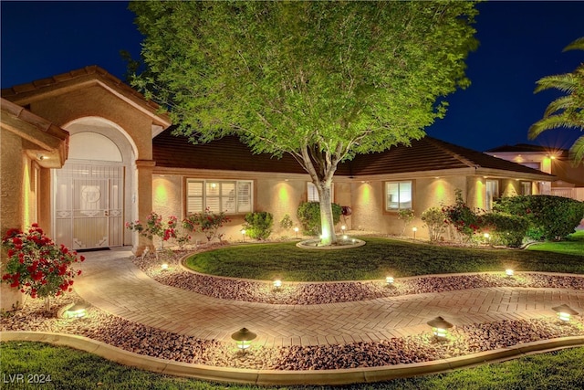 view of front of home featuring stucco siding