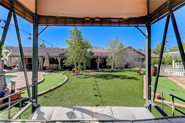 view of yard featuring a fenced backyard and a patio