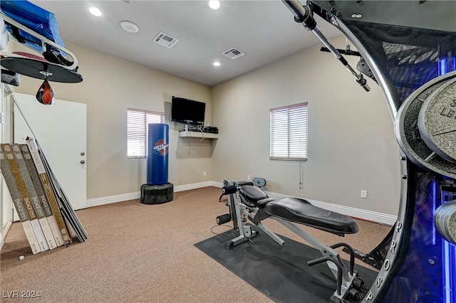 workout room featuring carpet, visible vents, baseboards, and recessed lighting