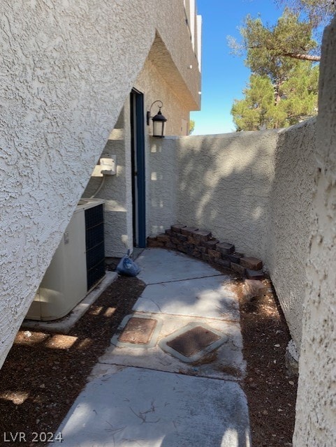 exterior space with central air condition unit