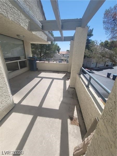 view of patio / terrace with a balcony