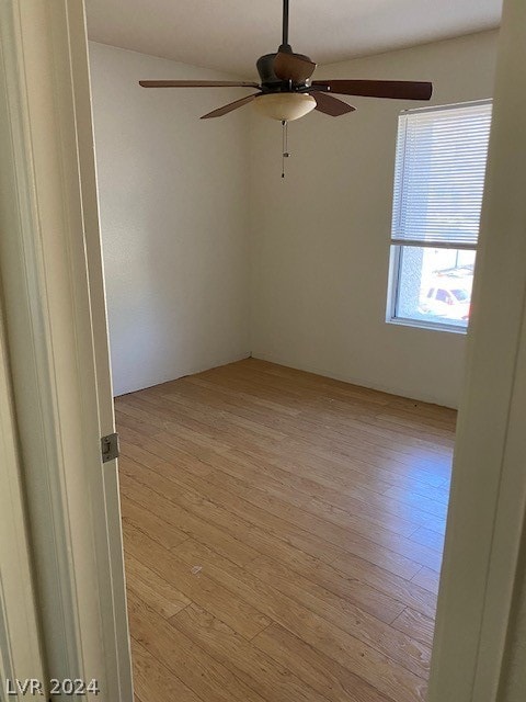 spare room with light hardwood / wood-style flooring