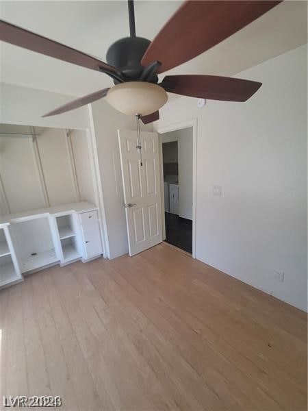 interior space with ceiling fan and light wood-type flooring