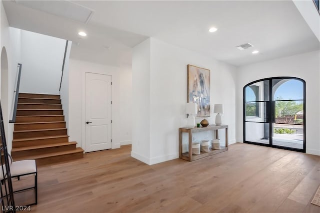 foyer with light wood-type flooring