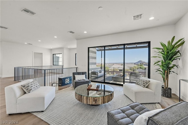 living room featuring light wood-type flooring