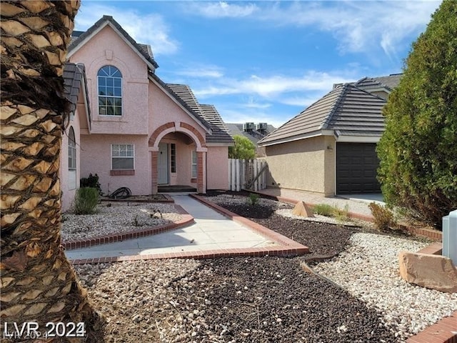 front of property featuring a garage