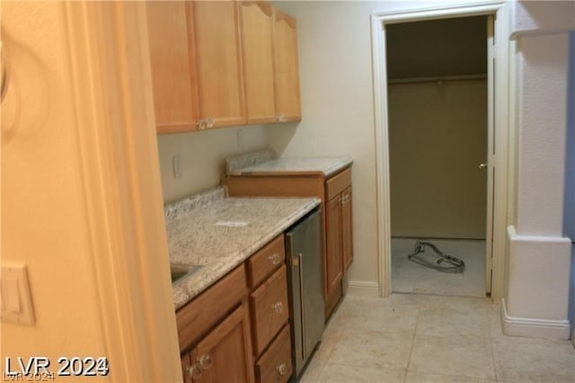 kitchen with light tile floors