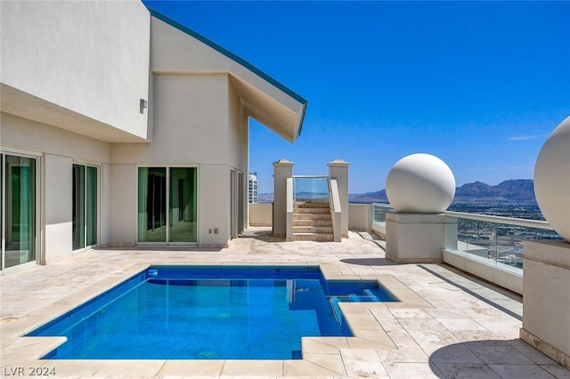 view of pool featuring a mountain view