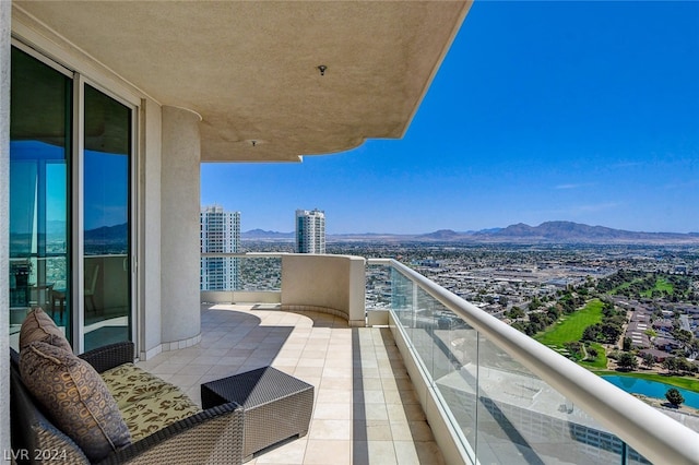 balcony featuring a mountain view