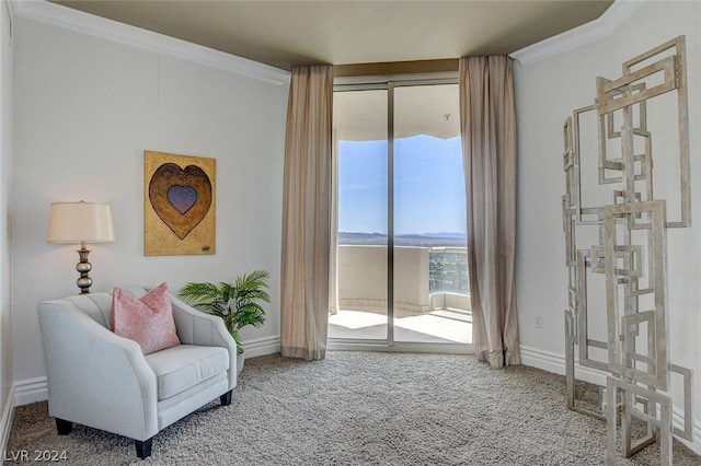 living area with crown molding and carpet floors