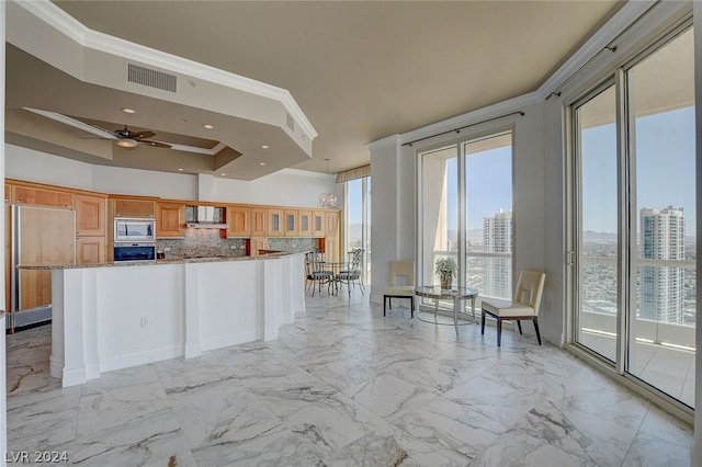 kitchen with crown molding, stainless steel appliances, light tile floors, tasteful backsplash, and ceiling fan