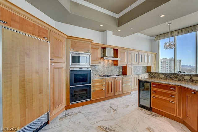 kitchen with wall chimney exhaust hood, built in appliances, wine cooler, backsplash, and ornamental molding