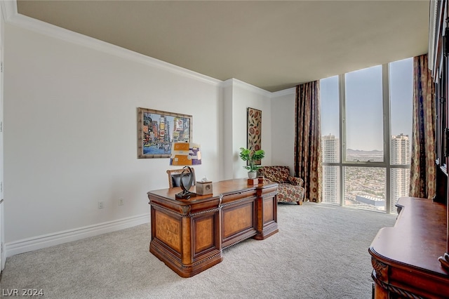 home office with carpet floors and ornamental molding