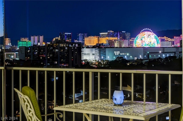 view of balcony at twilight