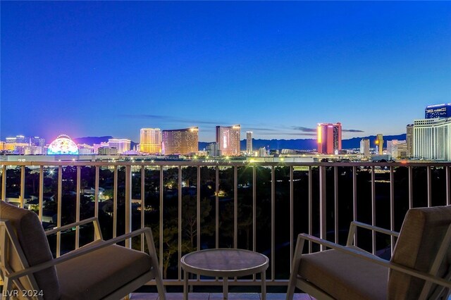 view of balcony at dusk