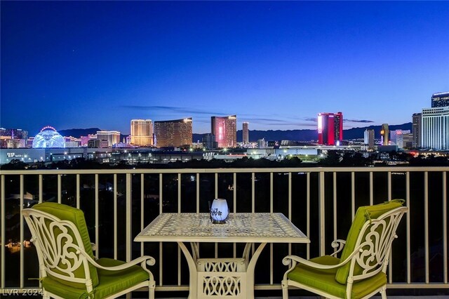 view of balcony at dusk