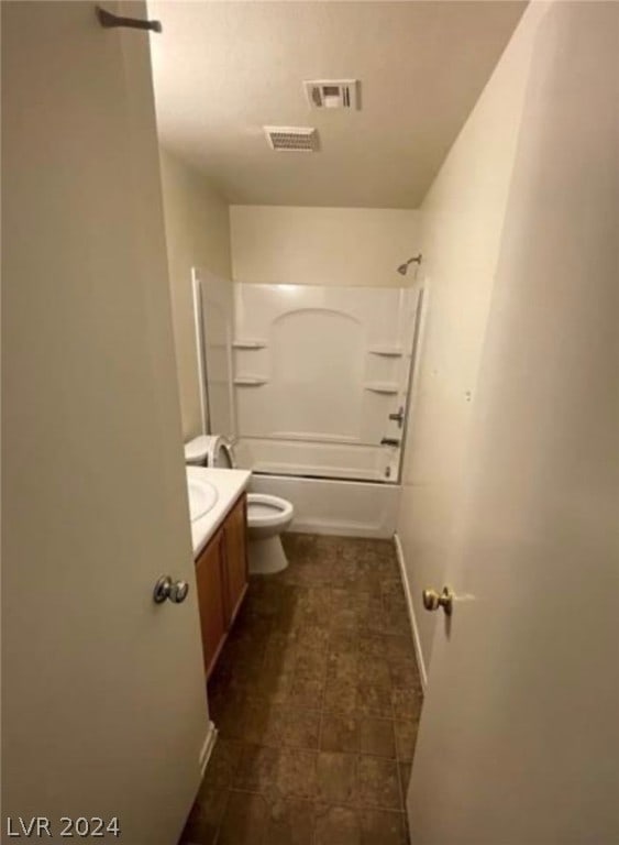 full bathroom featuring tile flooring, shower / bath combination, vanity, and toilet